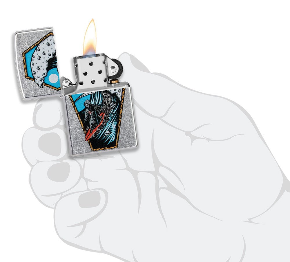 Reaper Surfer Design Street Chrome?äó Windproof Lighter lit in hand.