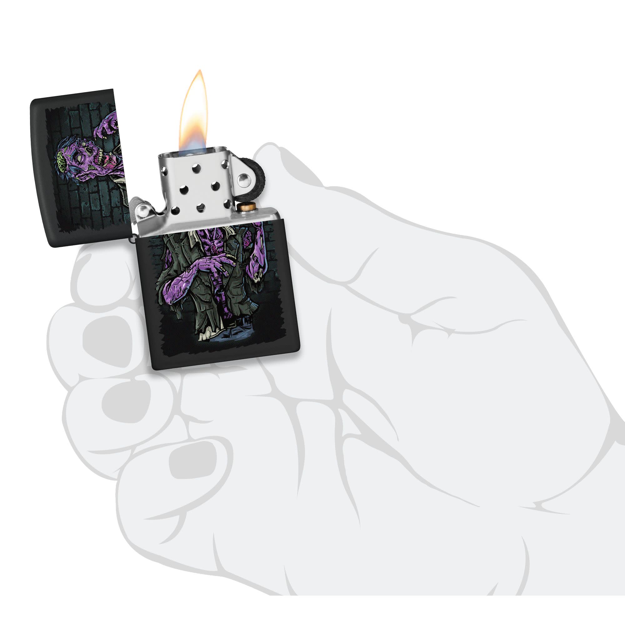 Zombie Design Windproof Lighter lit in hand.