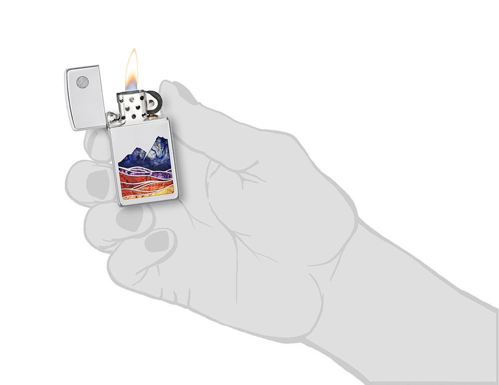 Slim?« Landscape Design High Polish Chrome Windproof Lighter lit in hand