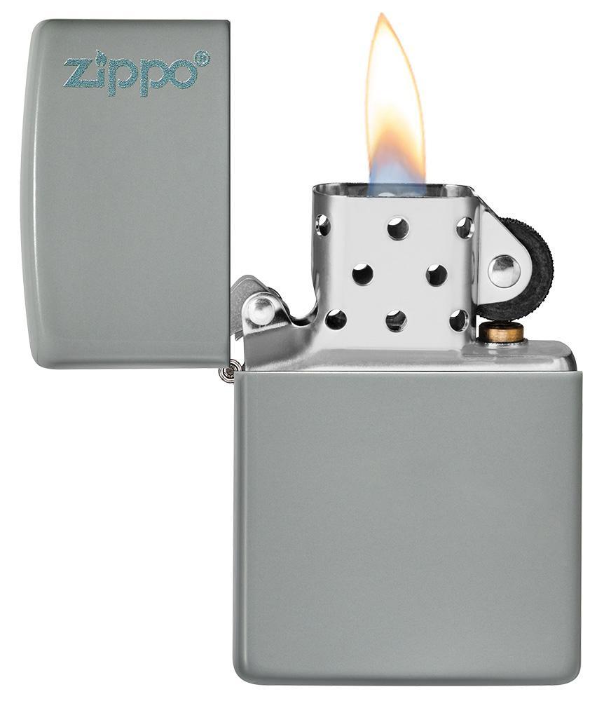 Classic Flat Grey Zippo Logo Windproof Lighter with its lid open and lit