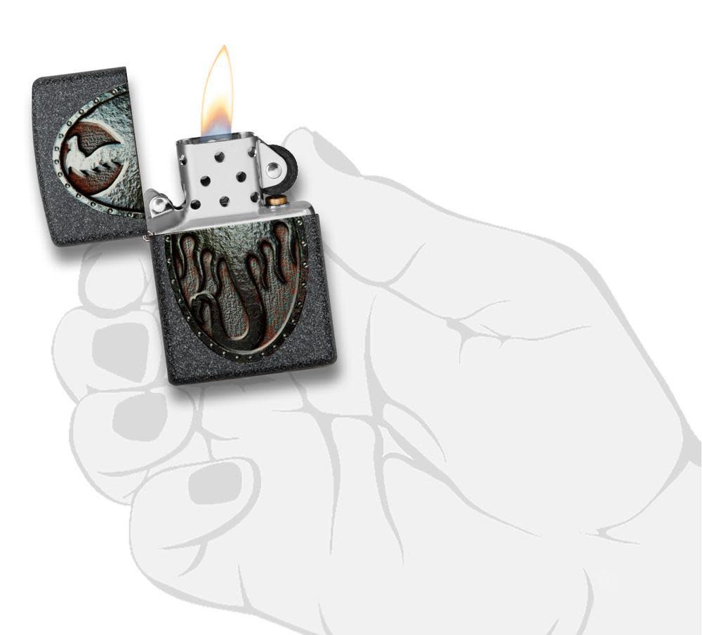 Metal Dragon Shield Design Iron Stone Lighter lit in hand
