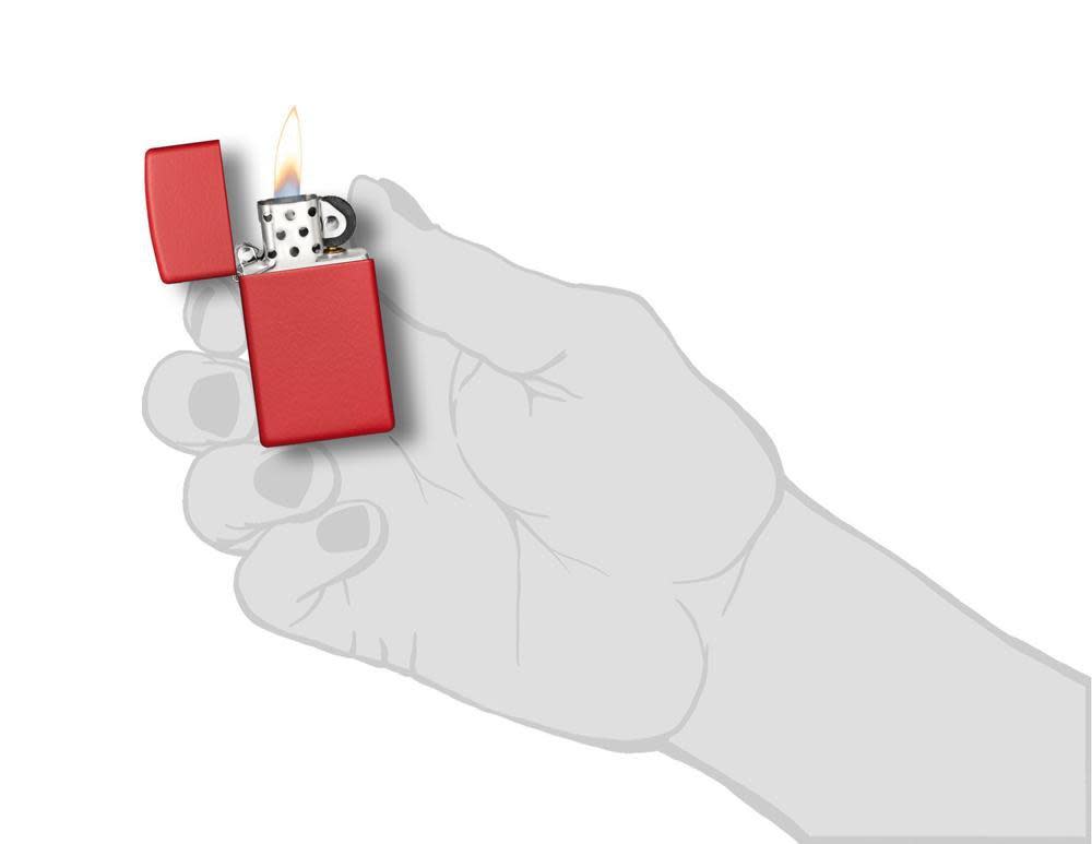 Front view of the Slim?« Red Matte, in hand, open and lit